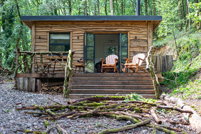 Log Cabin exterior in the woodland